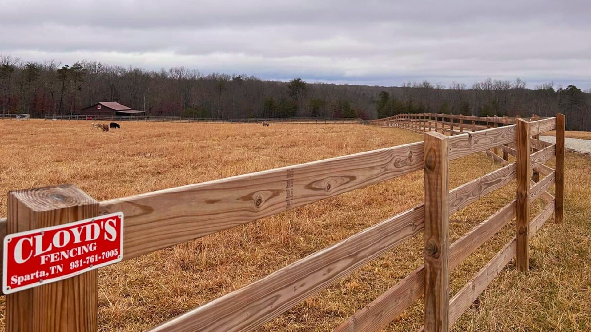 wood fence around farm by cloyds fencing